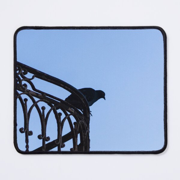 Item preview, Pigeon Silhouette Perched on Wrought Iron Balcony Railing Against Clear Blue Sky at Dusk designed and sold by Nmallia.