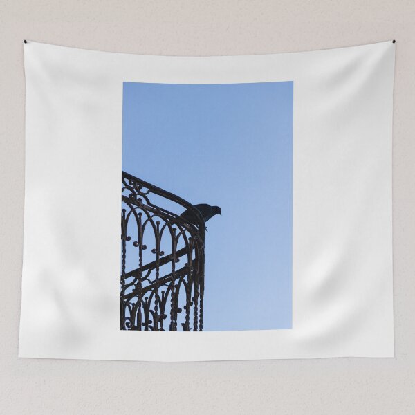 Item preview, Pigeon Silhouette Perched on Wrought Iron Balcony Railing Against Clear Blue Sky at Dusk designed and sold by Nmallia.