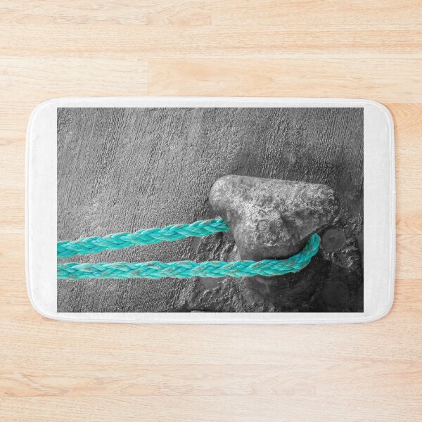 Item preview, Turquoise Rope Secured to Weathered Bollard on Dock - Nautical Mooring Close-Up With Texture designed and sold by Nmallia.