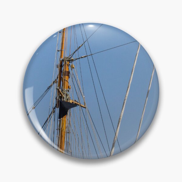 Item preview, Tall Wooden Sailboat Masts and Rigging Against Clear Blue Sky With Nautical Details designed and sold by Nmallia.