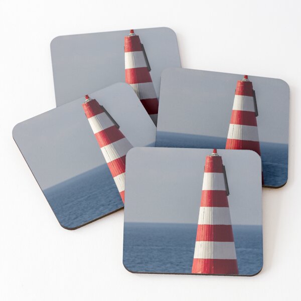 Item preview, Red and White Striped Coastal Beacon On Rocky Shore With Calm Blue Sea and Sky designed and sold by Nmallia.