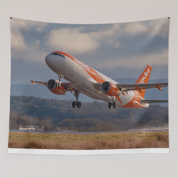 Item preview, Orange and White Ascent A320 Leaves Runway 23R designed and sold by Skyframe Aviation.