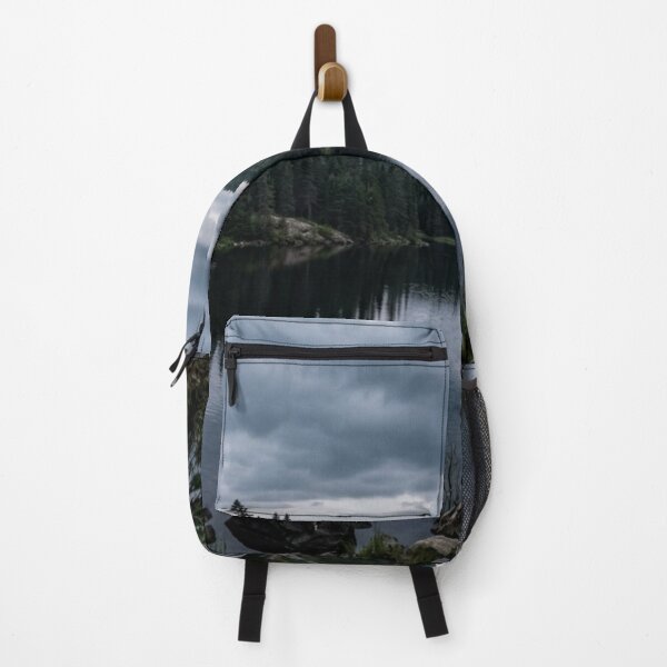 Item preview, Dark lake surrounded by pine trees designed and sold by Malisa345.