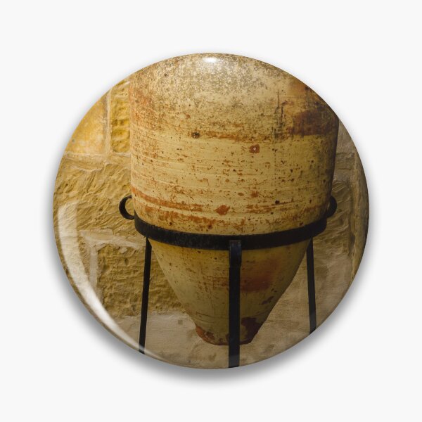 Item preview, Weathered Clay Amphora Pottery Jar On Iron Stand Against Sunlit Limestone Wall In Mediterranean Courtyard designed and sold by Nmallia.