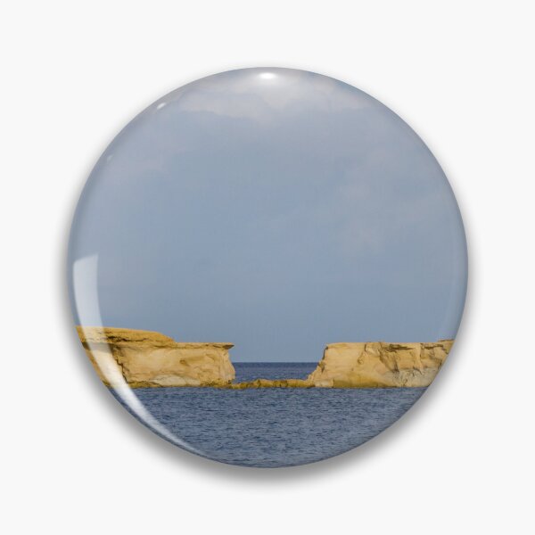 Item preview, Golden Sandstone Sea Stacks and Low Islets on Calm Blue Sea Beneath Soft Cloud Sky designed and sold by Nmallia.