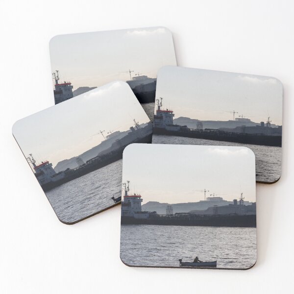 Item preview, Silhouette Cargo Ship and Small Rowboat on Calm Sea Near Coastal Construction at Dusk designed and sold by Nmallia.
