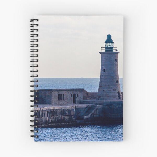 Item preview, Solitary Lighthouse on Stone Breakwater Overlooking Calm Blue Sea at Harbor Entrance With Distant Ship designed and sold by Nmallia.