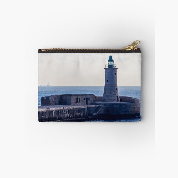 Item preview, Solitary Lighthouse on Stone Breakwater Overlooking Calm Blue Sea at Harbor Entrance With Distant Ship designed and sold by Nmallia.