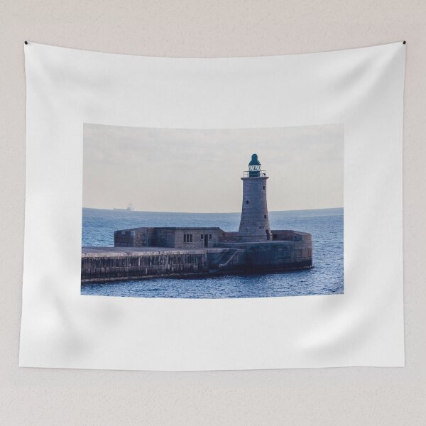 Item preview, Solitary Lighthouse on Stone Breakwater Overlooking Calm Blue Sea at Harbor Entrance With Distant Ship designed and sold by Nmallia.