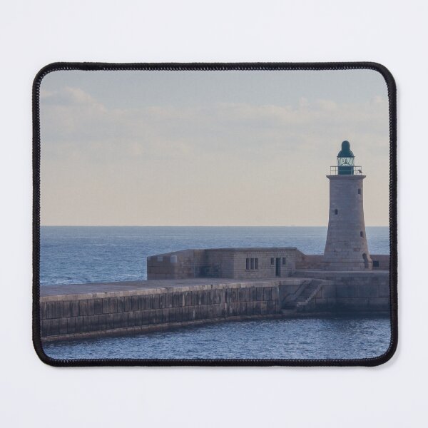 Item preview, Solitary Lighthouse on Stone Breakwater Overlooking Calm Blue Sea at Harbor Entrance With Distant Ship designed and sold by Nmallia.