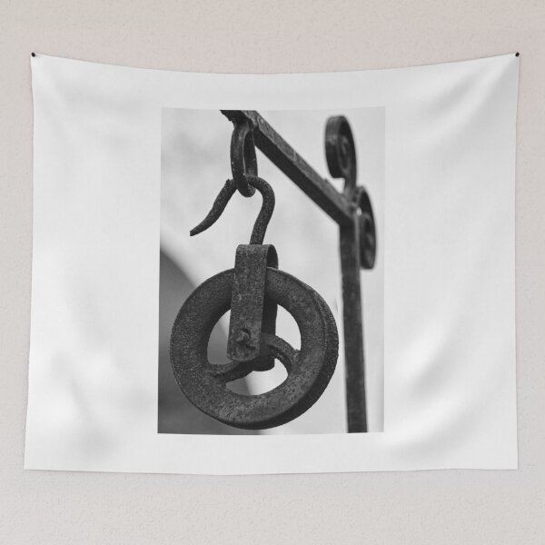 Item preview, Rusty Metal Pulley And Hook Hanging From Vintage Industrial Iron Bracket, Black And White Close-Up designed and sold by Nmallia.