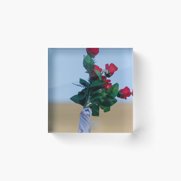 Item preview, Red Rose Bouquet Against Soft Blue Sky With Green Leaves and Wrapped Stem, Romantic Floral Close-Up designed and sold by Nmallia.