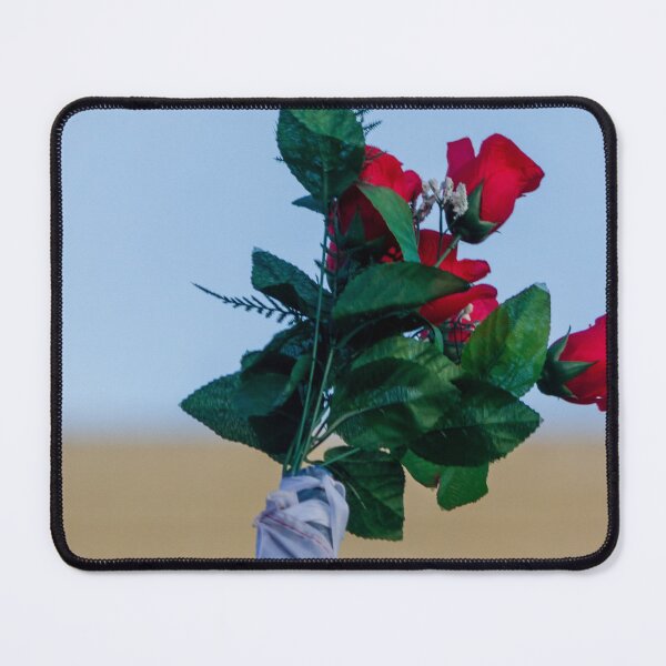 Item preview, Red Rose Bouquet Against Soft Blue Sky With Green Leaves and Wrapped Stem, Romantic Floral Close-Up designed and sold by Nmallia.