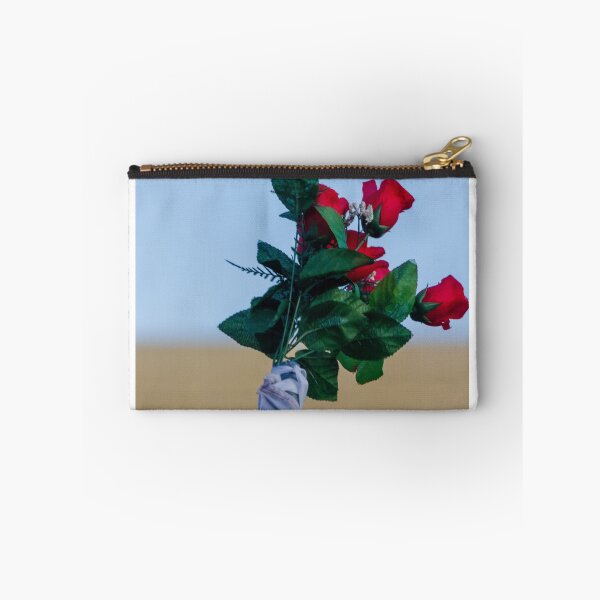 Item preview, Red Rose Bouquet Against Soft Blue Sky With Green Leaves and Wrapped Stem, Romantic Floral Close-Up designed and sold by Nmallia.