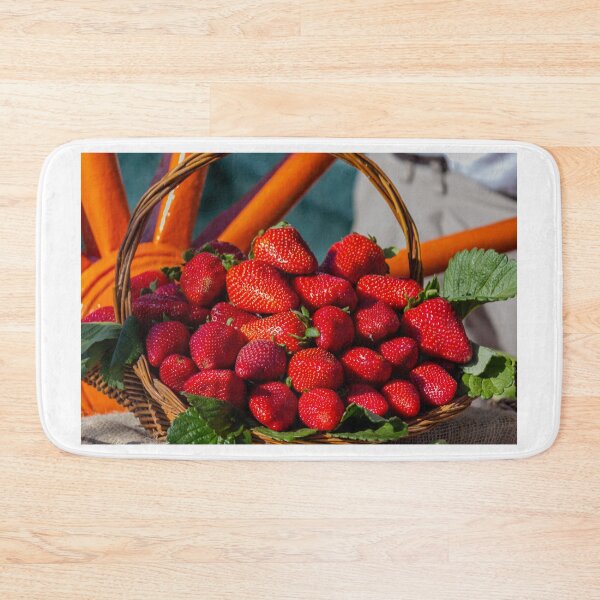 Item preview, Fresh Red Strawberries in a Wicker Basket With Green Leaves on a Rustic Market Display designed and sold by Nmallia.