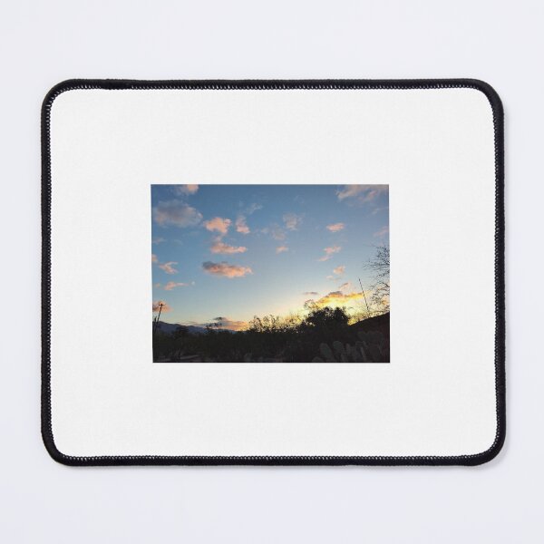 Item preview, sunrise sunset puffball clouds designed and sold by Scruffy-Sid.