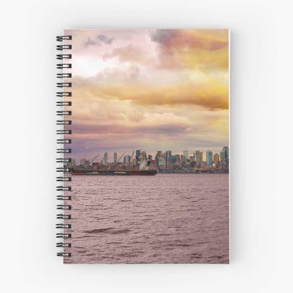 Item preview, Seattle Washington city skyline along Elliot Bay in Puget Sound from Alki Beach during sunset designed and sold by davidgnsx1.