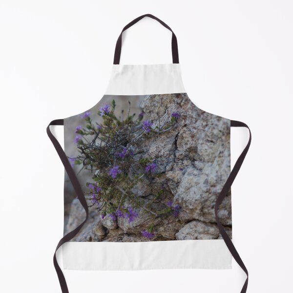 Item preview, Purple Wildflowers Growing From a Rocky Crevice on Limestone Cliff Close-Up Showing Resilience designed and sold by Nmallia.