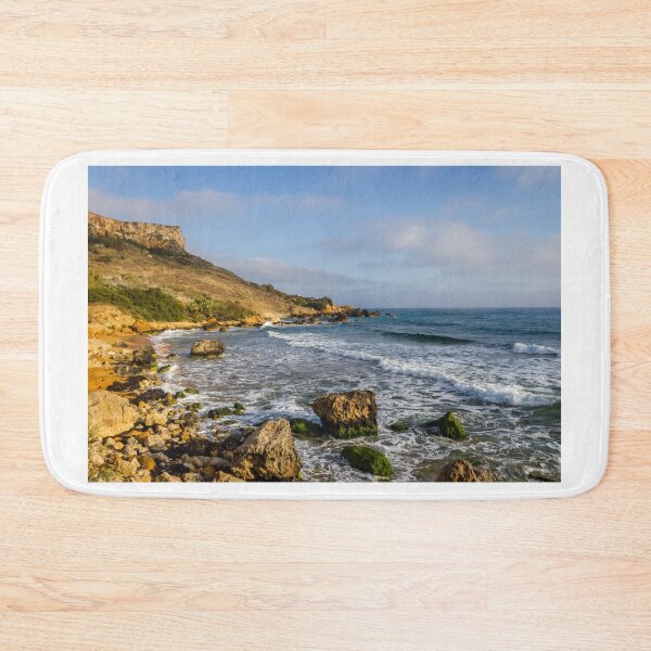 Item preview, Rocky Coastal Beach With Cliffs, Waves and Moss-Covered Boulders Under Blue Sky designed and sold by Nmallia.
