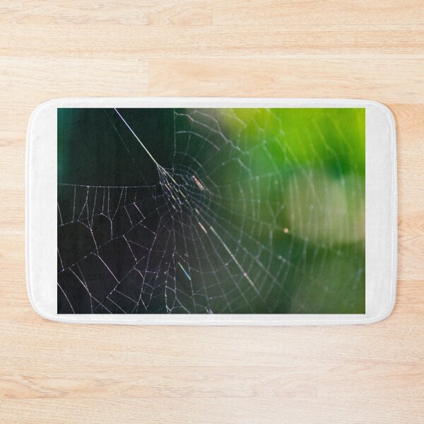 Item preview, Intricate Spider Web Macro With Dew Drops And Soft Green Bokeh Background In Nature designed and sold by Nmallia.