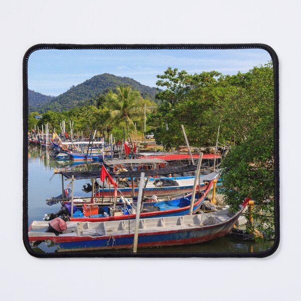 Item preview, Colorful fishing boats docked by the river under clear blue sky designed and sold by Kevin Miller Photography.