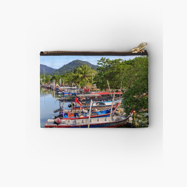 Item preview, Colorful fishing boats docked by the river under clear blue sky  designed and sold by Kevin Miller Photography.
