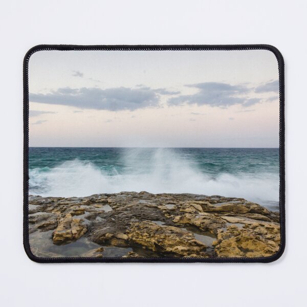 Item preview, Ocean Waves Crashing Against Rocky Shore At Dusk With Pastel Sky And Distant Horizon designed and sold by Nmallia.