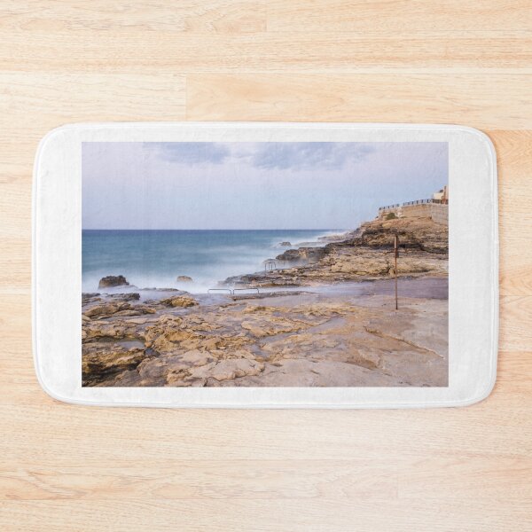 Item preview, Misty Ocean Waves Over Rocky Coastline With Metal Handrails and Steps At Sunset designed and sold by Nmallia.
