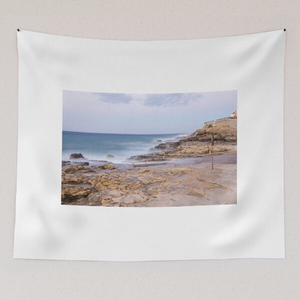 Item preview, Misty Ocean Waves Over Rocky Coastline With Metal Handrails and Steps At Sunset designed and sold by Nmallia.