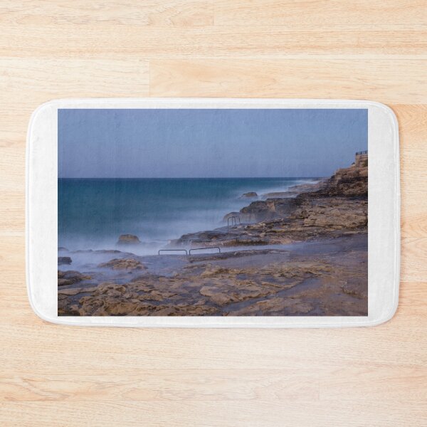 Item preview, Misty Ocean Waves Over Rocky Coastline With Metal Handrails and Steps At Sunset designed and sold by Nmallia.