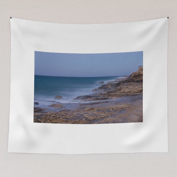 Item preview, Misty Ocean Waves Over Rocky Coastline With Metal Handrails and Steps At Sunset designed and sold by Nmallia.