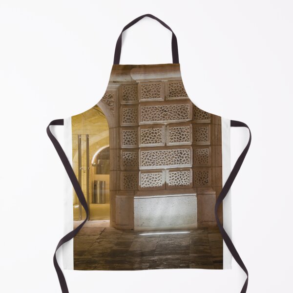Item preview, Illuminated Historic Stone Wall With Ornate Carved Blocks And Glass Entrance At Night designed and sold by Nmallia.