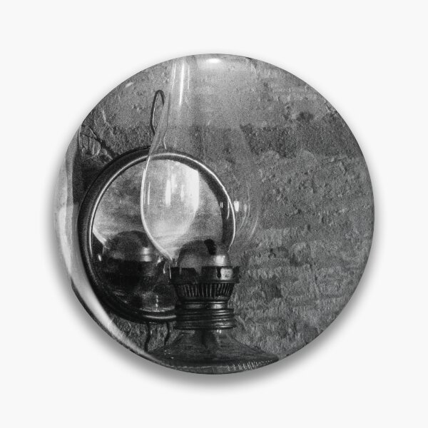 Item preview, Vintage Oil Lamp On Rustic Wall Shelf In Black And White Interior Photograph Evoking Nostalgia designed and sold by Nmallia.