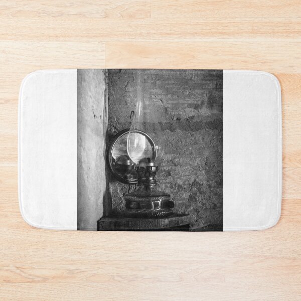 Item preview, Vintage Oil Lamp On Rustic Wall Shelf In Black And White Interior Photograph Evoking Nostalgia designed and sold by Nmallia.