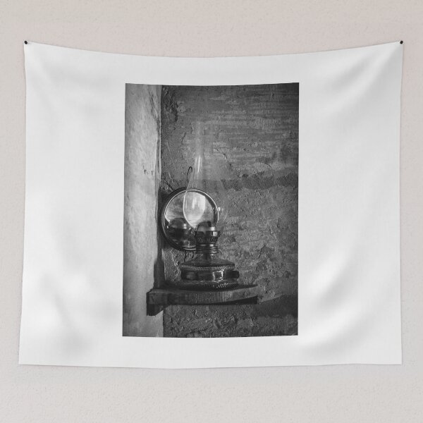 Item preview, Vintage Oil Lamp On Rustic Wall Shelf In Black And White Interior Photograph Evoking Nostalgia designed and sold by Nmallia.