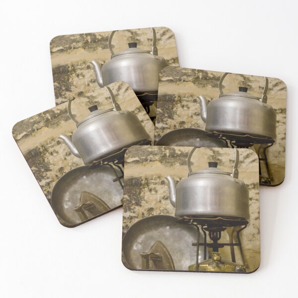 Item preview, Vintage Aluminum Kettle on Brass Camp Stove With Iron and Pan Against Rustic Stone Wall designed and sold by Nmallia.