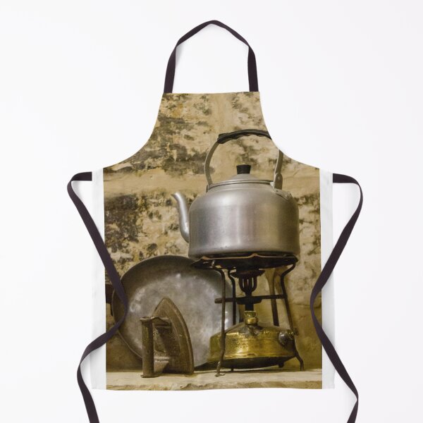 Item preview, Vintage Aluminum Kettle on Brass Camp Stove With Iron and Pan Against Rustic Stone Wall designed and sold by Nmallia.