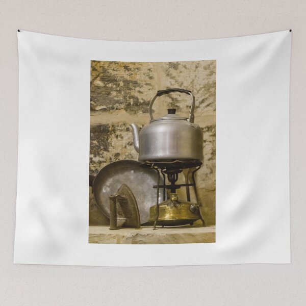 Item preview, Vintage Aluminum Kettle on Brass Camp Stove With Iron and Pan Against Rustic Stone Wall designed and sold by Nmallia.