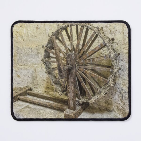 Item preview, Antique Wooden Spinning Wheel Against Stone Wall in Rustic Historic Workshop designed and sold by Nmallia.