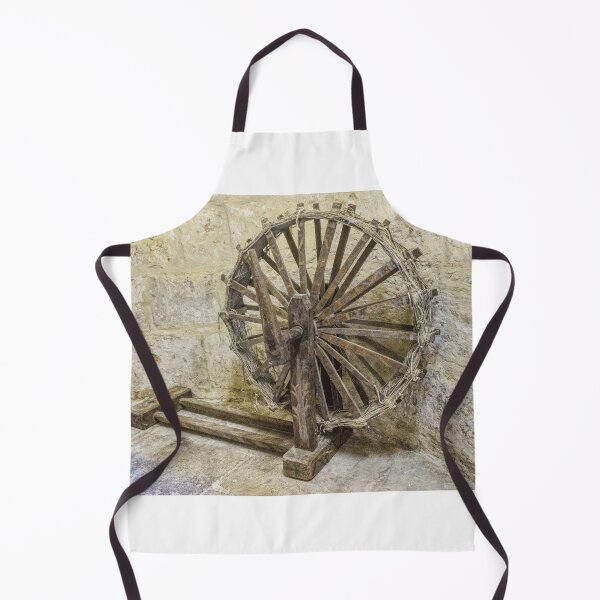 Item preview, Antique Wooden Spinning Wheel Against Stone Wall in Rustic Historic Workshop designed and sold by Nmallia.
