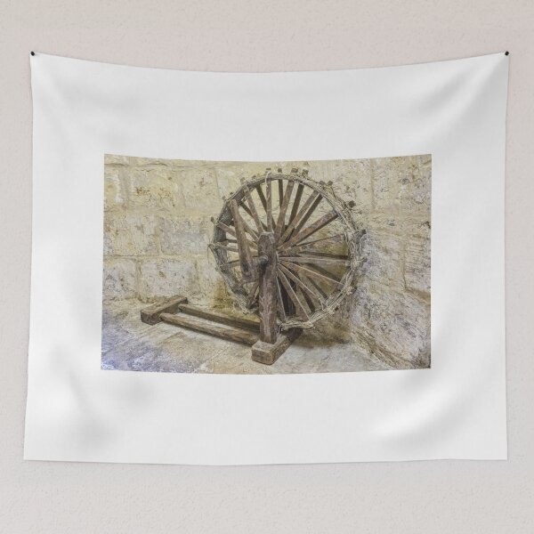 Item preview, Antique Wooden Spinning Wheel Against Stone Wall in Rustic Historic Workshop designed and sold by Nmallia.