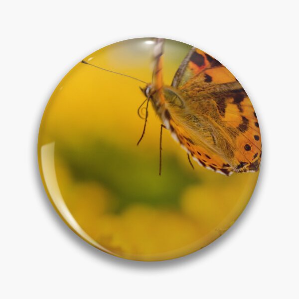 Item preview, Painted Lady Butterfly Hovering Over Bright Yellow Flowers In Sunlit Summer Garden designed and sold by Nmallia.