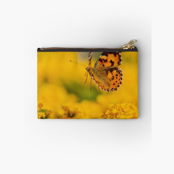 Item preview, Painted Lady Butterfly Hovering Over Bright Yellow Flowers In Sunlit Summer Garden designed and sold by Nmallia.