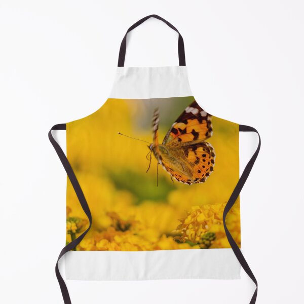 Item preview, Painted Lady Butterfly Hovering Over Bright Yellow Flowers In Sunlit Summer Garden designed and sold by Nmallia.