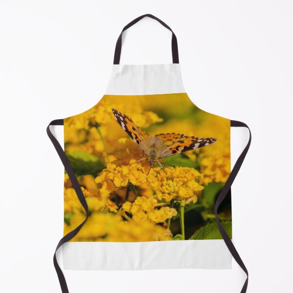 Item preview, Painted Lady Butterfly Hovering Over Bright Yellow Flowers In Sunlit Summer Garden designed and sold by Nmallia.