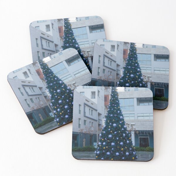 Item preview, Decorated Christmas Tree In Urban Plaza With Modern Apartment Buildings And Wet Pavement Reflections designed and sold by Nmallia.