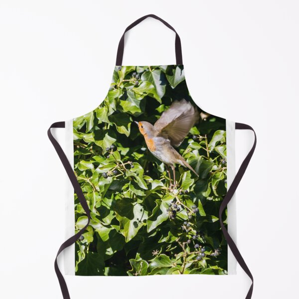 Item preview, European Robin Taking Flight Among Green Ivy Berries in Sunlit Garden Foliage designed and sold by Nmallia.
