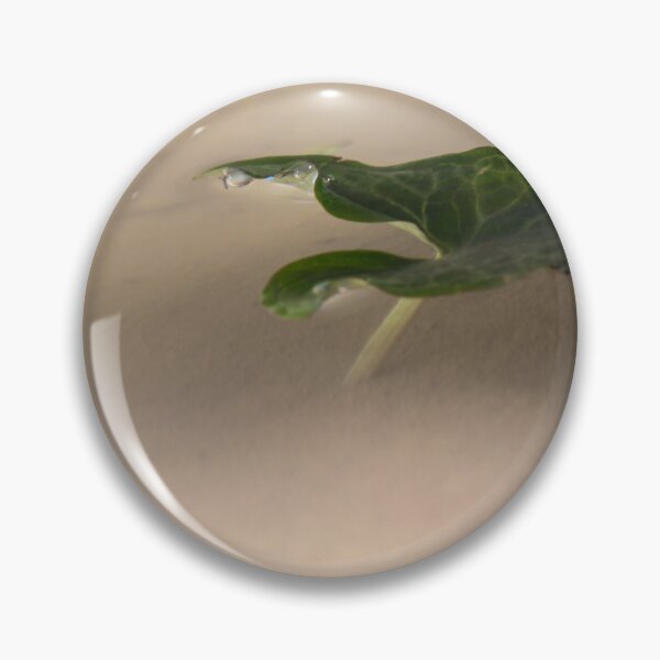 Item preview, Floating Green Leaf With Water Droplets Close-Up Minimal Nature Composition And Calm Reflection designed and sold by Nmallia.