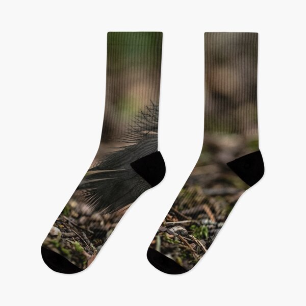 Item preview, Black feather about to fall to the ground designed and sold by Malisa345.