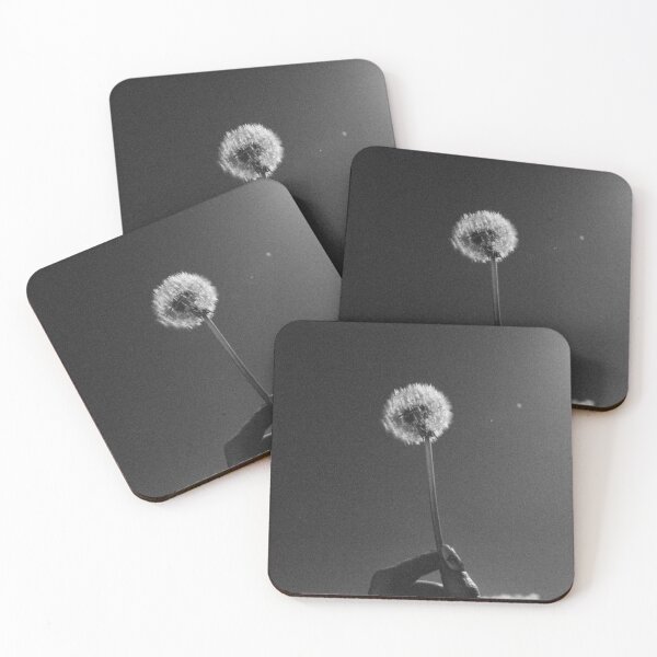 Item preview, Artistic black and white photo of a dandelion and hand silhouetted against the sky. designed and sold by Silent Messages.